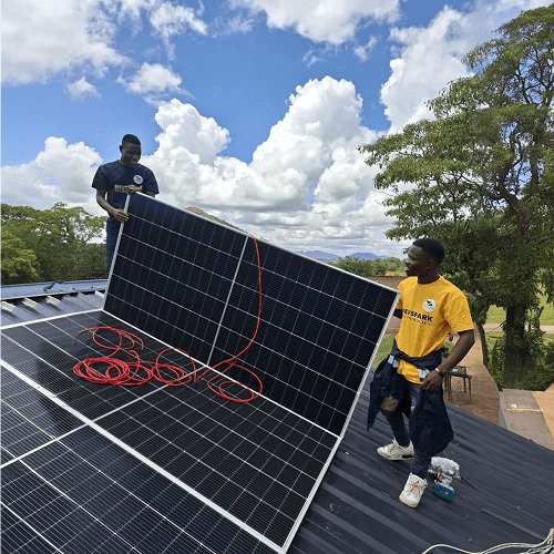 Solar panels being setup on roof by engineers - TrevSpark Completed Work